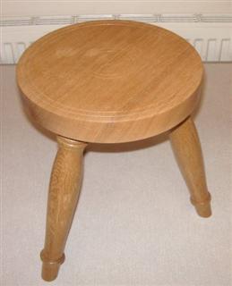 Oak three legged stool by Norman Smithers